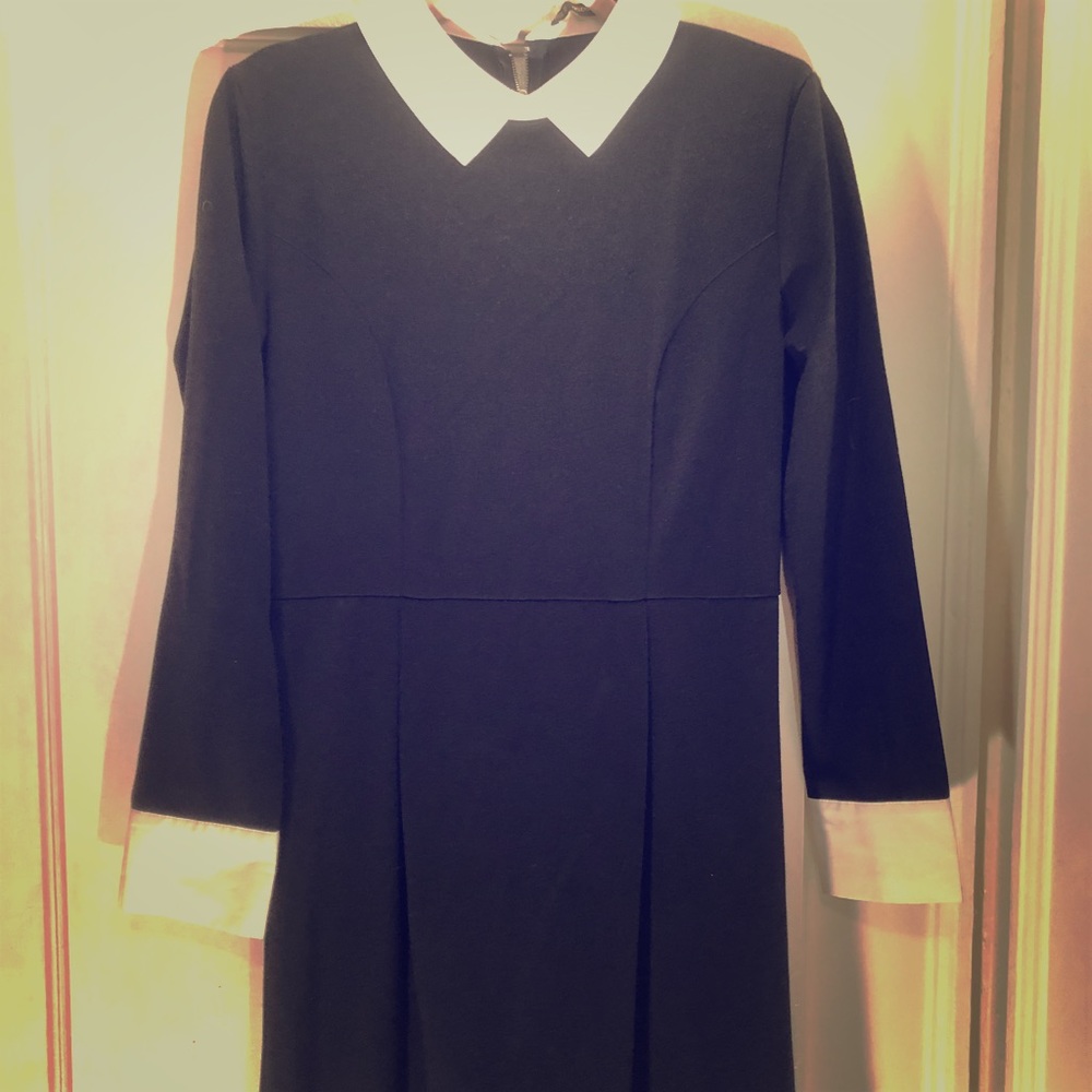 Black and white tuxedo zippered back dress.